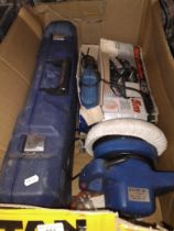 A box of tools including AEG recipricating saw, Black & Decker electric planer, Promax electric