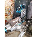 A Makita LS1018L chop saw.