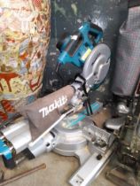 A Makita LS1018L chop saw.