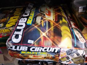 A Scalextric Club Circuit Magnateaction. Includes track, 2 cars, controllers etc