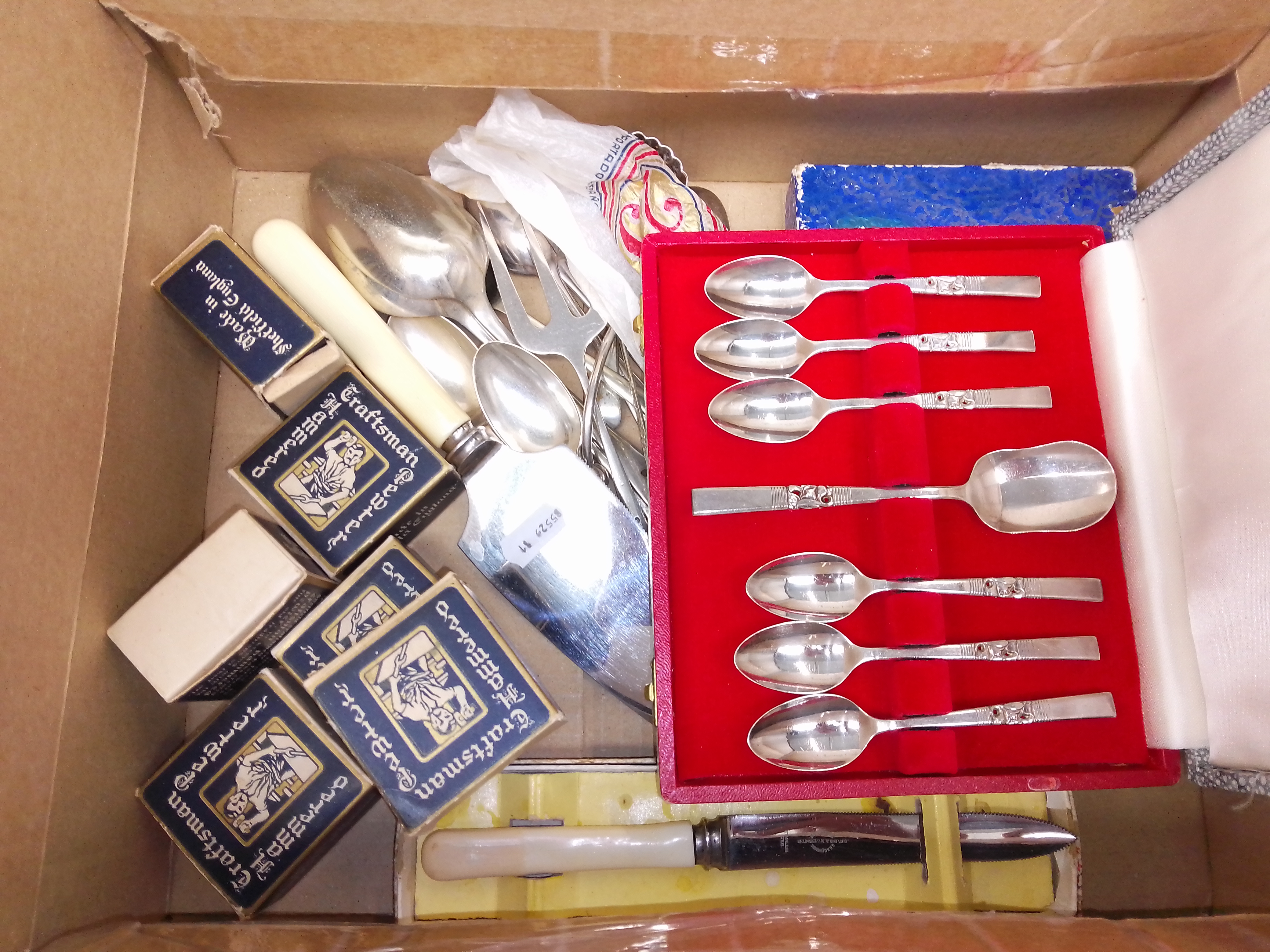 Various pieces of silver plated cutlery, pewter napkin rings, etc.