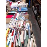 Eight boxes of books and ephemera including a box of vintage car handbooks including Austin 7, MG