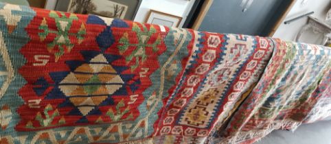 Three Turkish style Kilim pattern wool carpets.