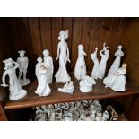 Eleven Royal Doulton figurines.