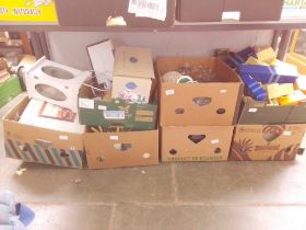 10 boxes including kitchenware, glass wares, boxed lit village collection, a box of pictures, soda