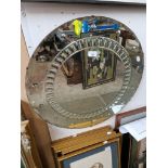 A 1930s Art Deco circular etched glass wall mirror.
