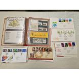 Album of 36 presentation packs of mint stamps with more than 80 FDC in plastic wallet