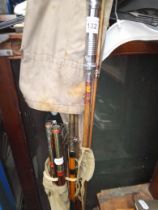 A bundle of vintage fishing rods including split cane examples.