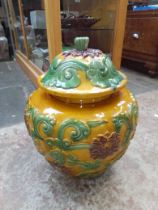A large chines pot and cover.