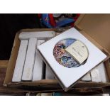 A box of collectors plates an oil on board, two mirrors and a print.