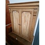 A Victorian glazed pine bookcase/cabinet.