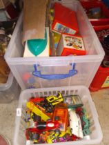 A box of vintage toys to include fisher price etc. and a box of diecast vehicles to include Matchbox