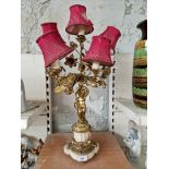 A late 19th century gilt metal and marble four branch candelabra converted to electric, height 69cm.