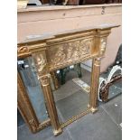 A Regency gilt framed pier mirror with architectural column supports, later mirrored glass.