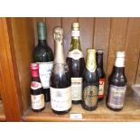 7 bottles of alcoholic beverages including 1928 Lanson Champagne, Guinness, brown ale etc.