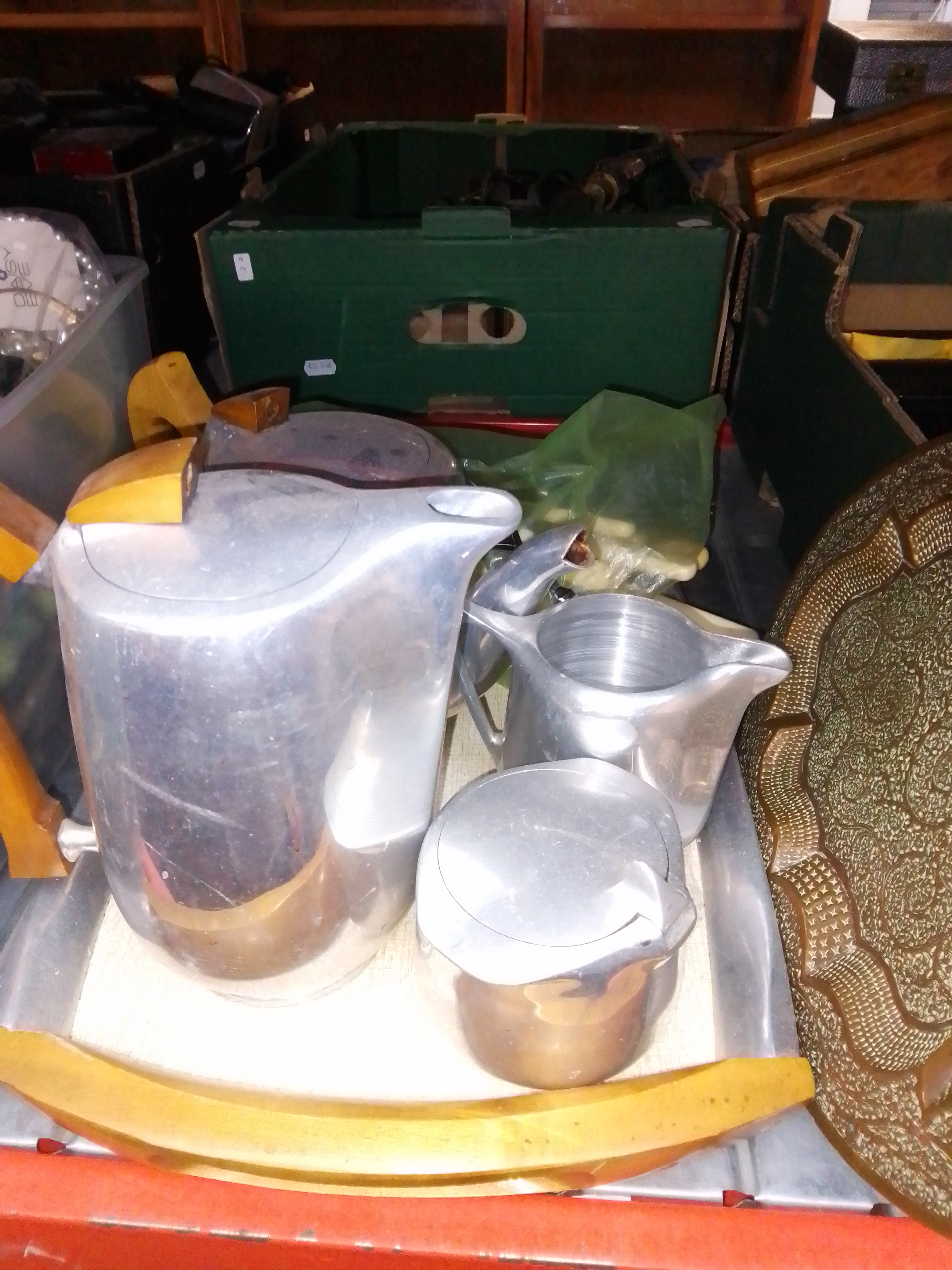 A picquot ware tea set, a Persian brass tray and a mixed lot of cutlery.