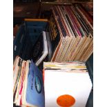 A box of LPs and singles