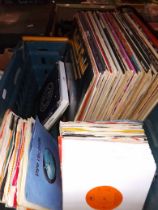 A box of LPs and singles