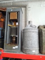 A paraffin heater and a galvanised container