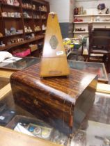 A Victorian coromandel work box & a vintage metronome.