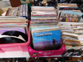2 boxes of assorted LPs and 4 boxes of various 45s