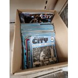 A box of Manchester City football programmes, 1970s/1980s.