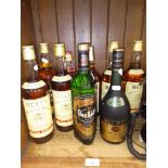 5 bottles (unopened) of Bells whisky, a bottle of Napoleon Brandy, a bottle of Teachers whisky, a