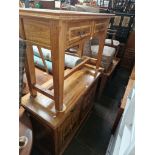 A parquetry inlaid hardwood dining room suite comprising dining table and six chairs, sideboard