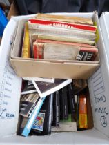 A box of books; including a box of early 20th century cookery and housekeeping books including one