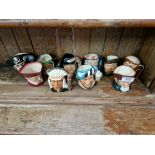 10 small Royal Doulton character jugs including Fat Boy, North American Indian etc.