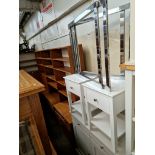 A pair of painted bedside cabinets, matching cabinet and a chrome and glass top table.