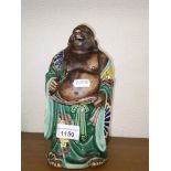 An early 20th century Chinese ceramic Buddha figure,