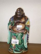 An early 20th century Chinese ceramic Buddha figure,