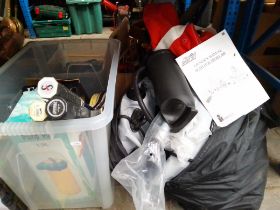 An inflatable dinghy (not tested), and a box of mixed items including golf shoes, tennis racquets,