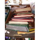 A box of assorted stamp & stamp albums