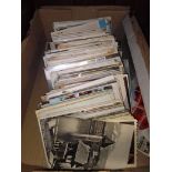 A box of vintage postcards