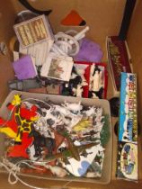 A box of assorted vintage toys.