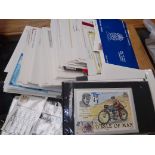 A collection of various first day covers and mint stamps.