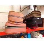 A cased quarter size violin (AF) and four empty violin cases