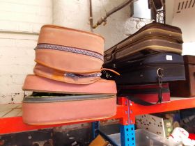 A cased quarter size violin (AF) and four empty violin cases