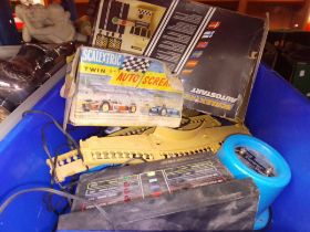 A box of vintage scaletric items