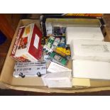 A box of toy cars, some in original boxes