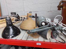 Various lamps and a magnifier, including anglepoise