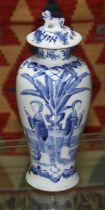 A Chinese porcelain baluster vase and cover, four character mark to base, height 26cm. Condition -