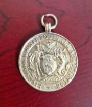 Liverpool County Football Association hallmarked 9ct gold Winners medal.