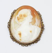 A shell cameo brooch, the mount marked '9ct', length 60mm.