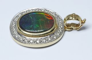 An ammolite and diamond pendant, marked '18K', length (including clasp) 32mm, gross wt. 4.9g.