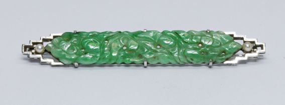 An Art Deco style jadeite jade and pearl brooch, similar to designs retailed by Liberty & Co, marked