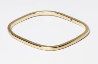 A square section rectangular bangle, marked '9ct', wt. 19.9g, length 65mm. Condition - good, general