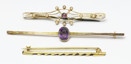 Three bar brooches; one set with an amethyst, one set with plist pearls and the third elephant